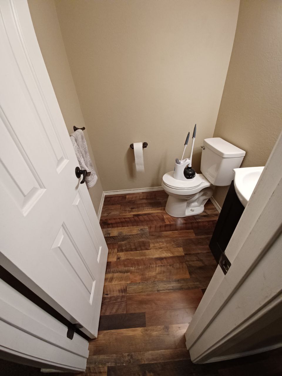 After Bathroom Flooring Renovation - New Premium Laminate Flooring Installation